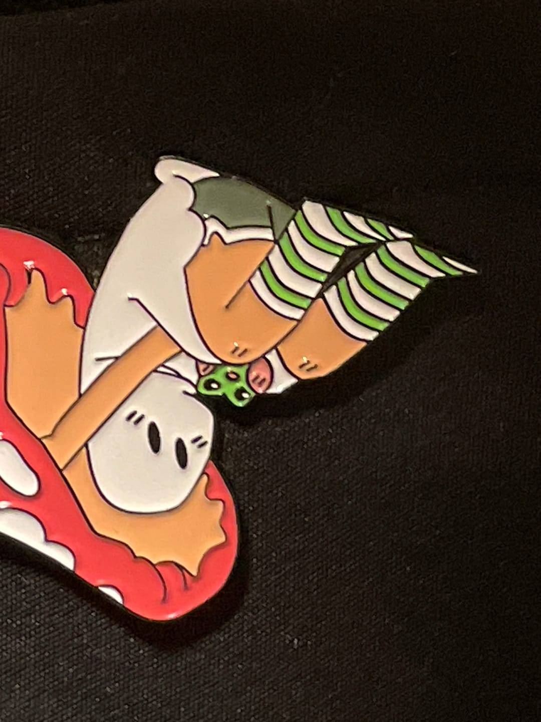 Customer photo review of Red Mushroom Ghost Enamel Pin