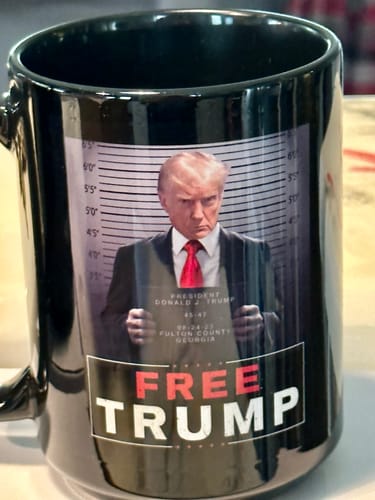 Customer photo review of Trump Mugshot Sign 15oz Coffee Mug