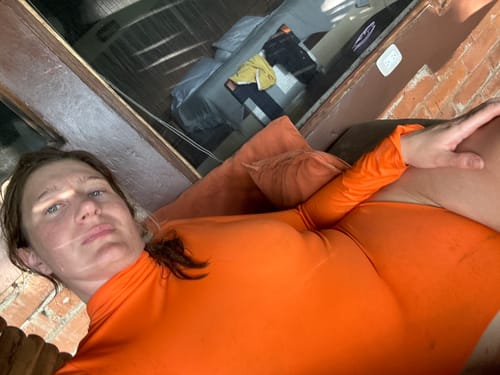 Customer photo review of Luna Vibrant Orange Long Sleeve