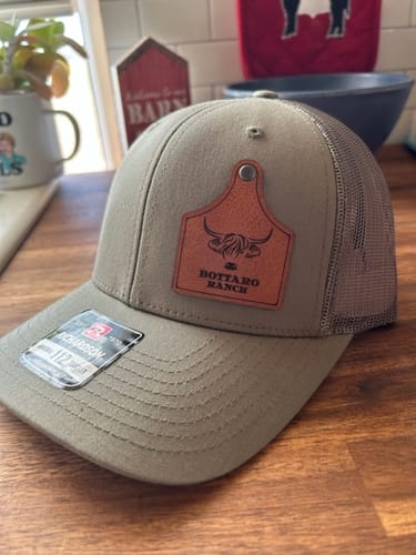Customer photo review of Ear Tag Custom Leather Patch Trucker Hat - Richardson 112