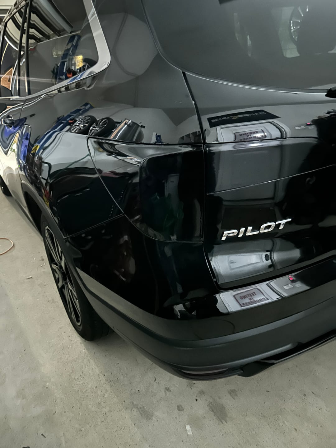 Customer photo review of Deep Black Headlight Film with Air Channel Paper Liner