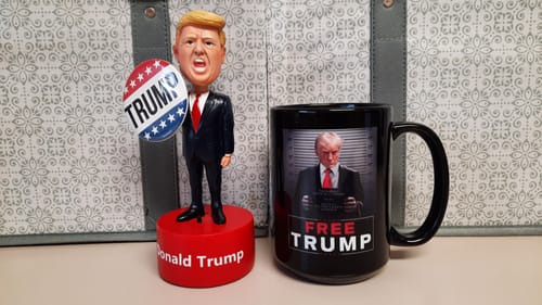 Customer photo review of Trump Mugshot Sign 15oz Coffee Mug