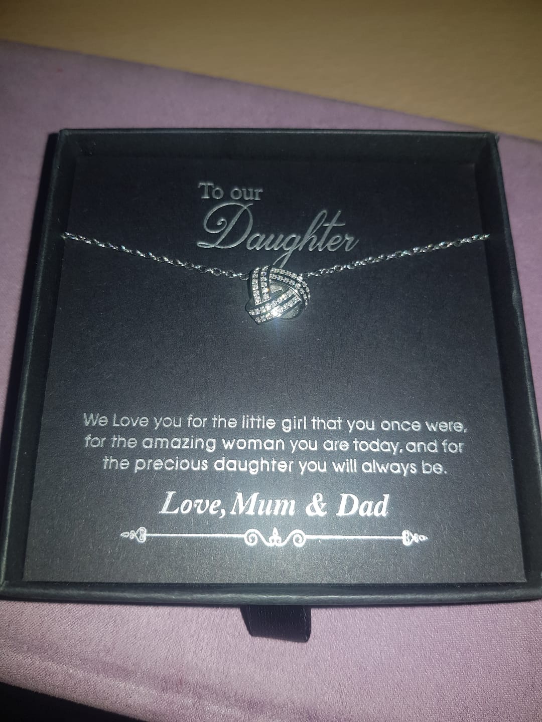 Customer photo review of TO MY DAUGHTER, LOVE MUM/ MUM AND DAD/ DAD -   Infinity Knot Necklace