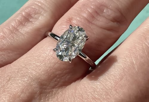 Customer photo review of Oval Elegance: The 3 Carat Crushed Ice Moissanite Ring