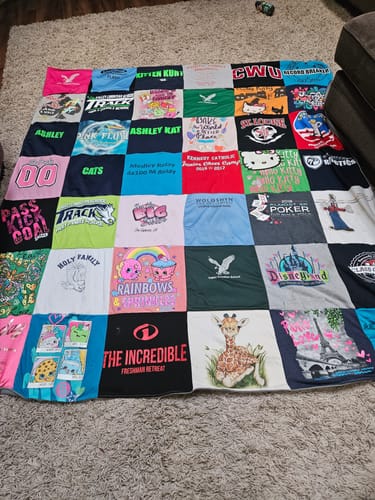 T-shirt quilt featuring rack by Gretchen from WA