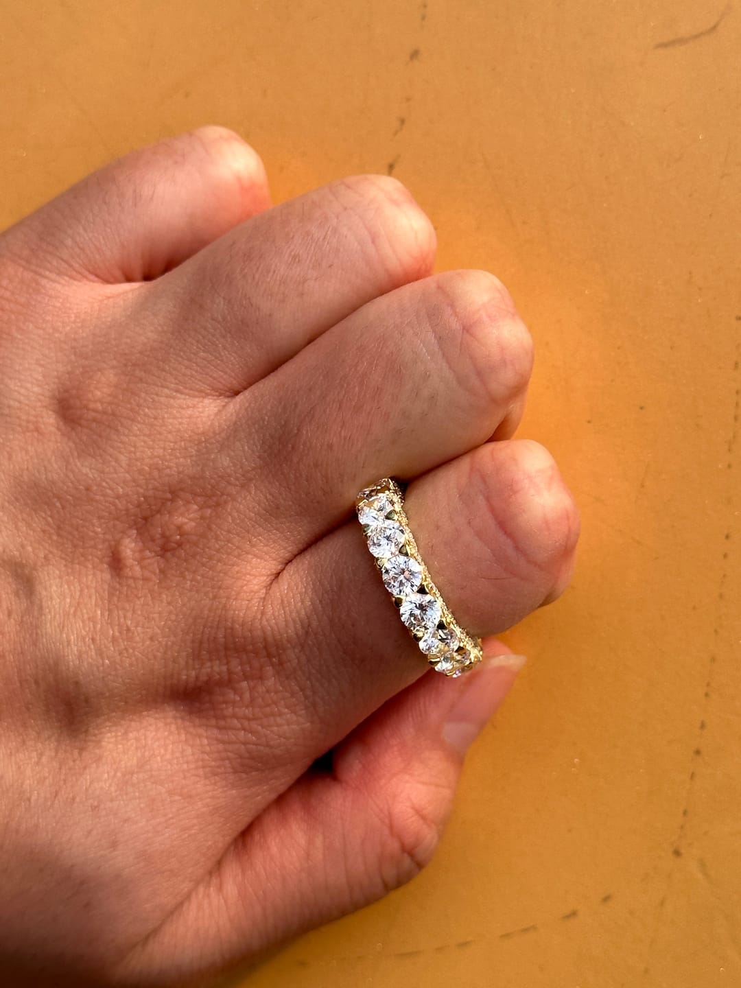 Customer photo review of Louily 5 Ct Luxury Eternity Round Cut Wedding Band In Sterling Silver