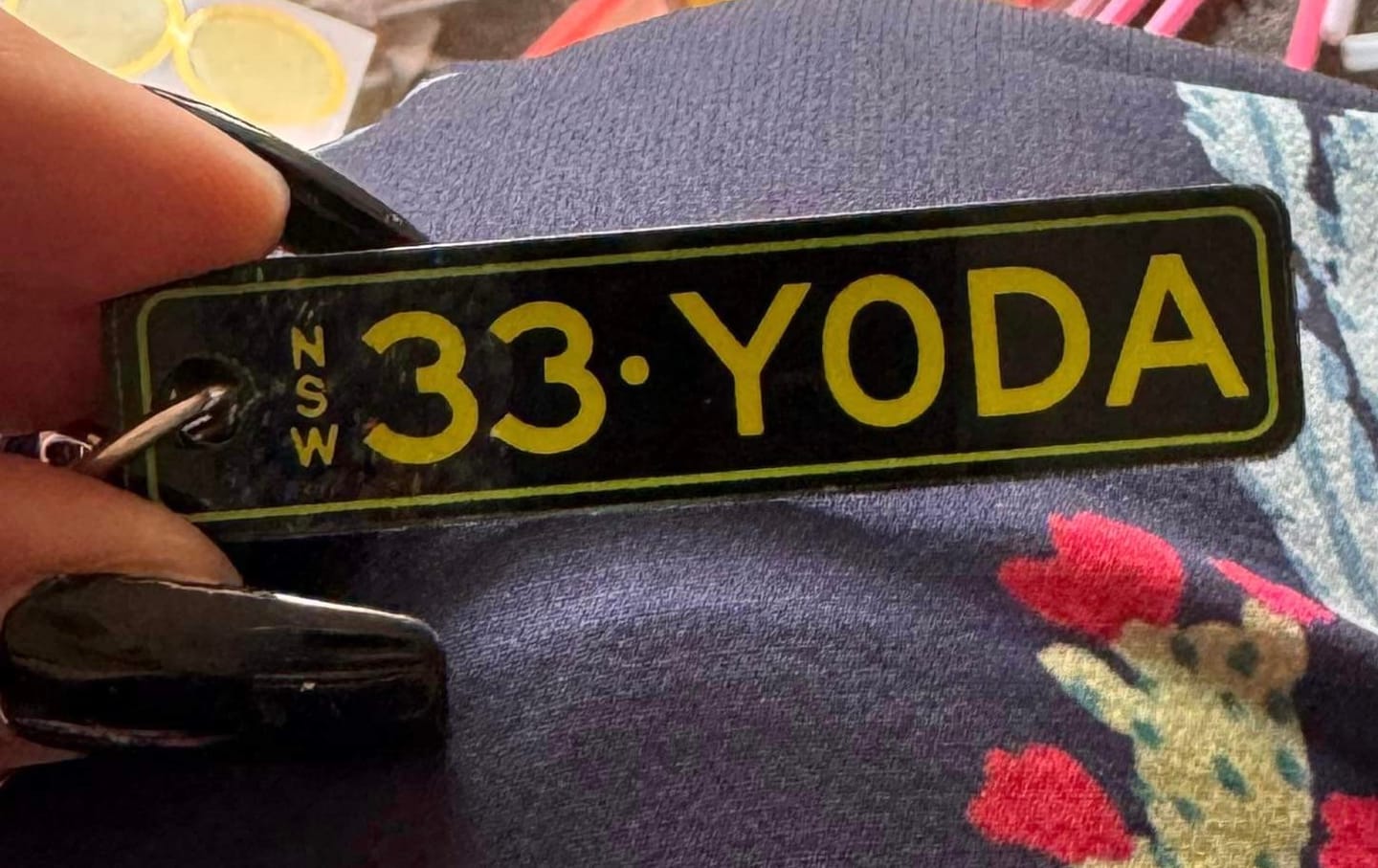 Customer photo review of NSW Colour on Black Licence Plate Custom Keychain