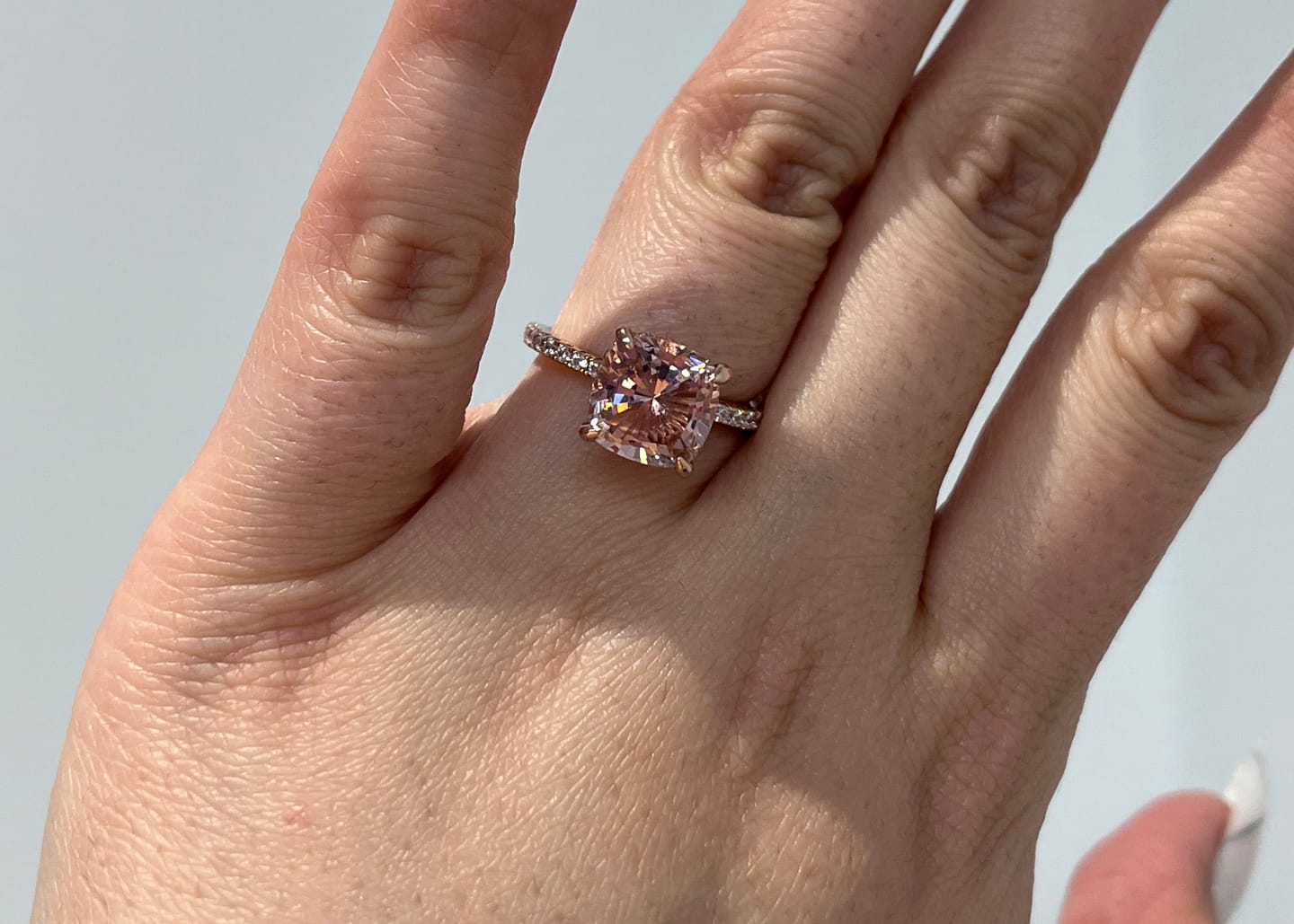 Customer photo review of Louily 3.5Ct Rose Gold Solitaire Cushion Cut Engagement Ring with Double Hidden Halo