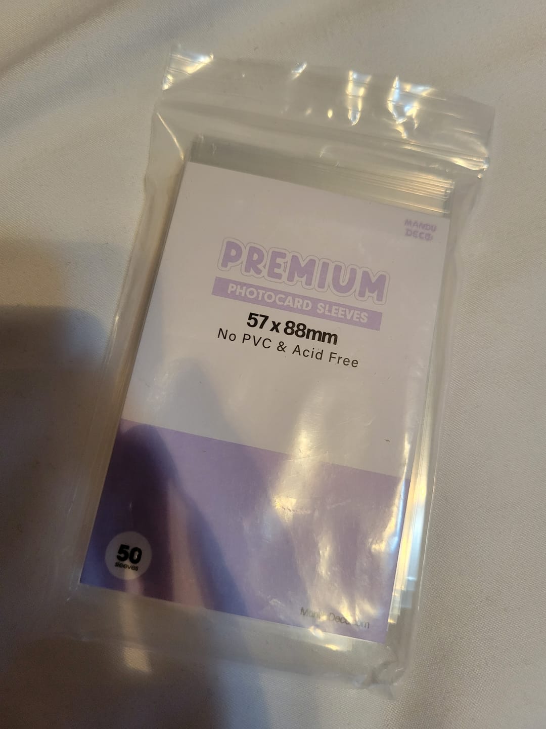 Customer photo review of PREMIUM PHOTOCARD SLEEVES - PINK VERSION (61x91MM)