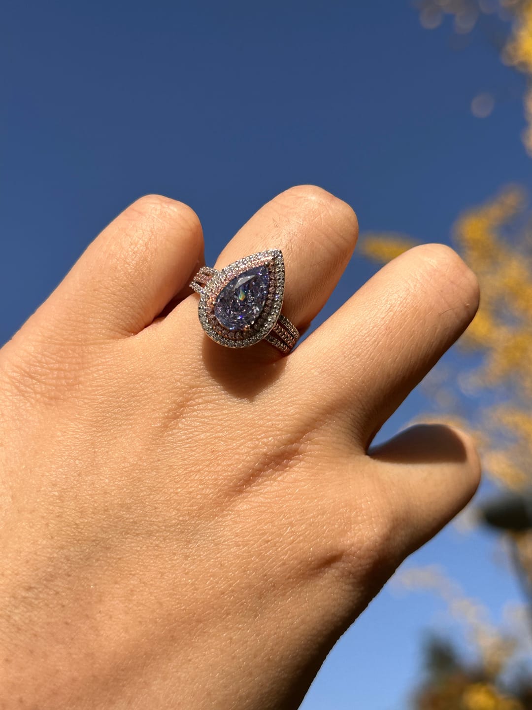 Customer photo review of Louily Luxurious Double Halo Pear Cut Aquamarine Blue/Purple Engagement Ring In Sterling Silver