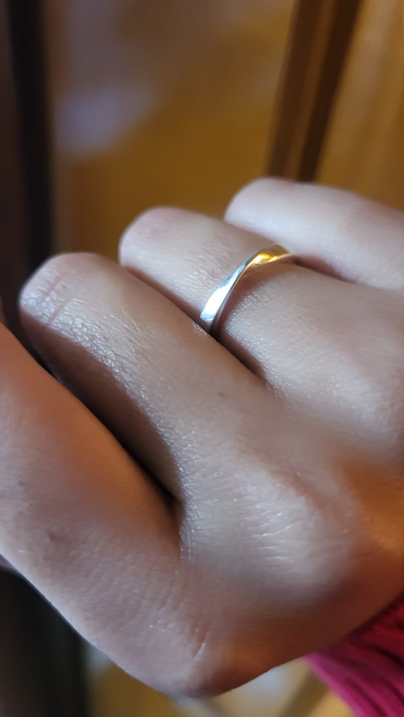 Customer photo review of Eternity Promise Sterling Silver Mobius Couple Rings