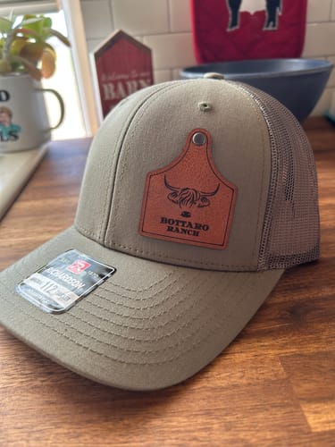 Customer photo review of Ear Tag Custom Leather Patch Trucker Hat - Richardson 112