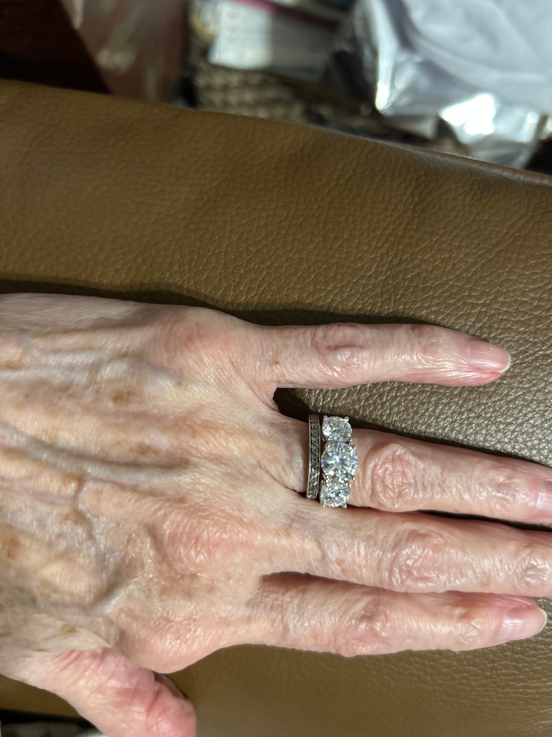Customer photo review of Classic Three Stone Round Cut Moissanite Sterling Silver Wedding Ring