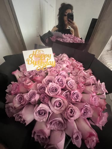 Customer photo review of Purple Rose Bouquet