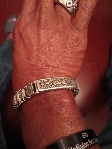 Customer photo review of Buddha Stones Tibet Om Mani Padme Hum Double Dorje Vajra Prayer Wheel Rotatable Wisdom Bracelet