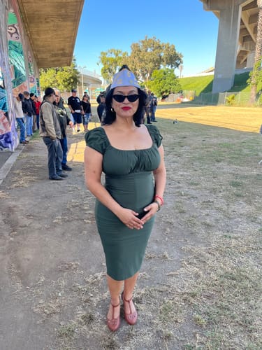 Customer photo review of Peasant Wiggle Dress in Olive Green - Vixen by Micheline Pitt