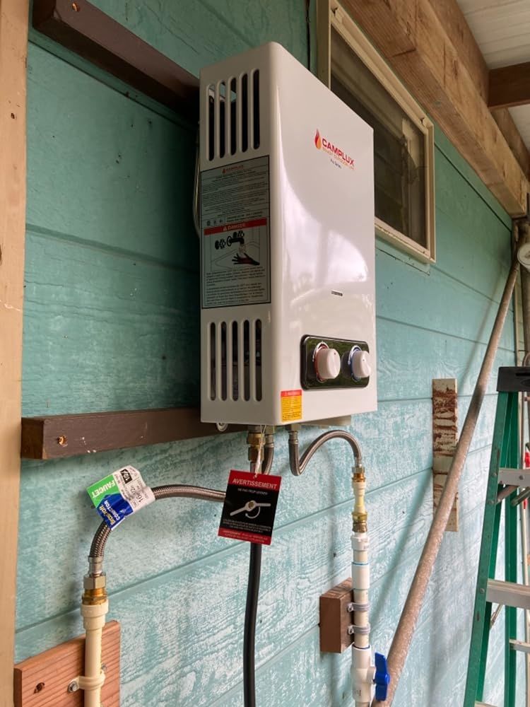 Customer photo review of Portable Tankless Water Heater, Camplux 1.58 GPM Outdoor Propane Hot Water Heater with S/S Rain Cap