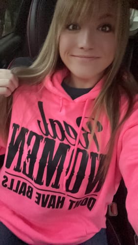 Customer photo review of Real Women Dont Have Balls | Neon Pink Hoodie