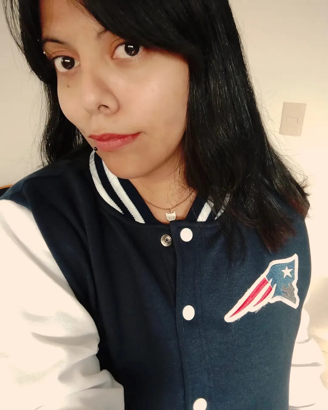 Customer photo review of Chamarra Universitaria NFL Patriots