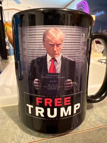 Customer photo review of Trump Mugshot Sign 15oz Coffee Mug