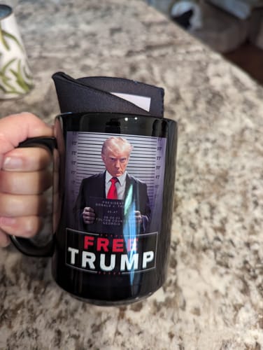 Customer photo review of Trump Mugshot Sign 15oz Coffee Mug
