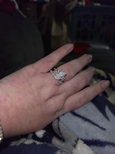 Customer photo review of Louily Gorgeous Three Stone Crushed Ice Radiant Cut Engagement Ring
