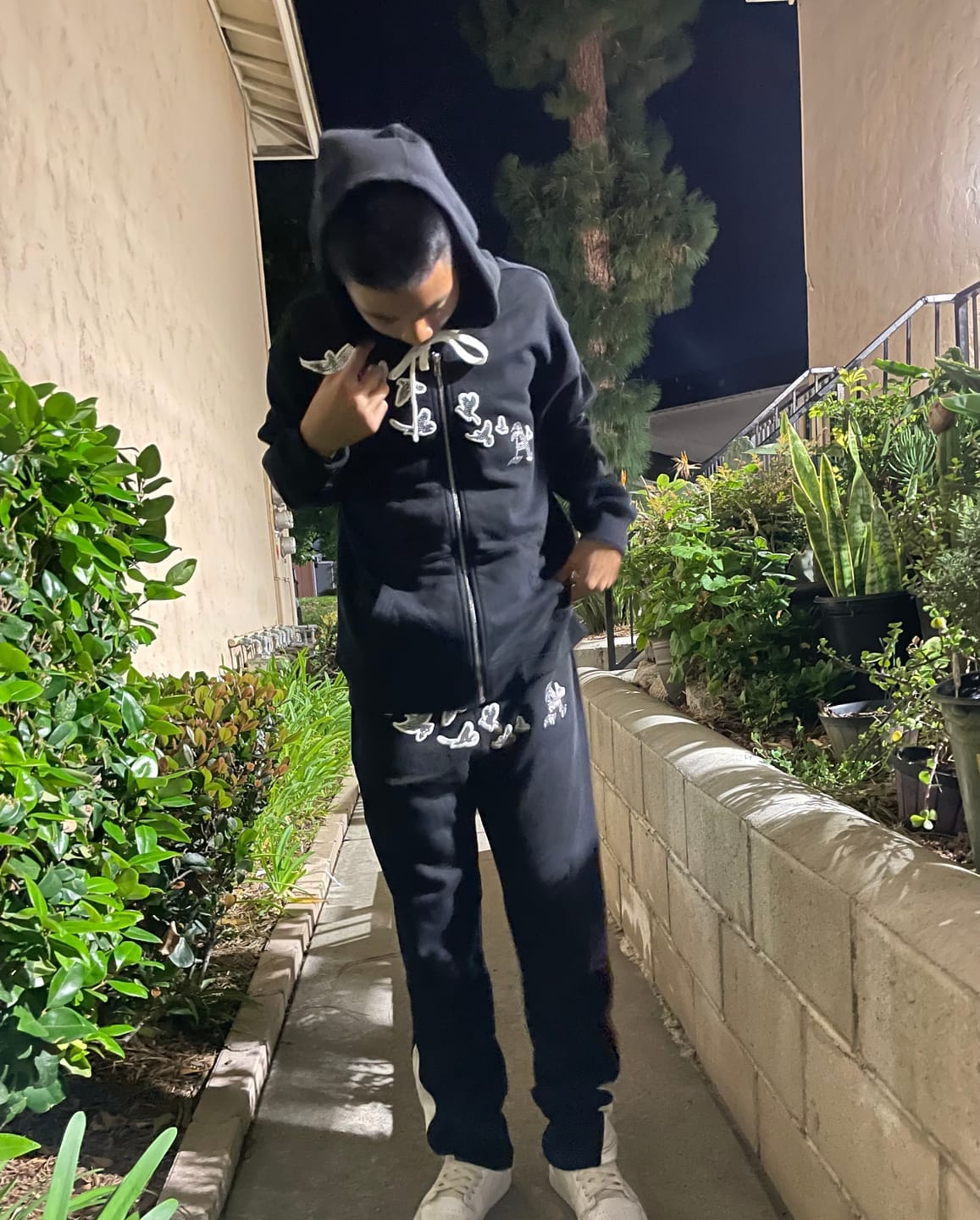 Customer photo review of Black "Iced Out Flocka Doves" FlyFleece Flared Pants