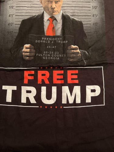 Customer photo review of Trump Mugshot Sign T-Shirt
