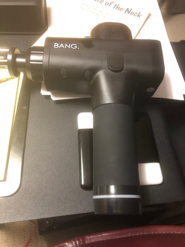 Customer photo review of BANG Massage Gun (w/Free Massage Ball)