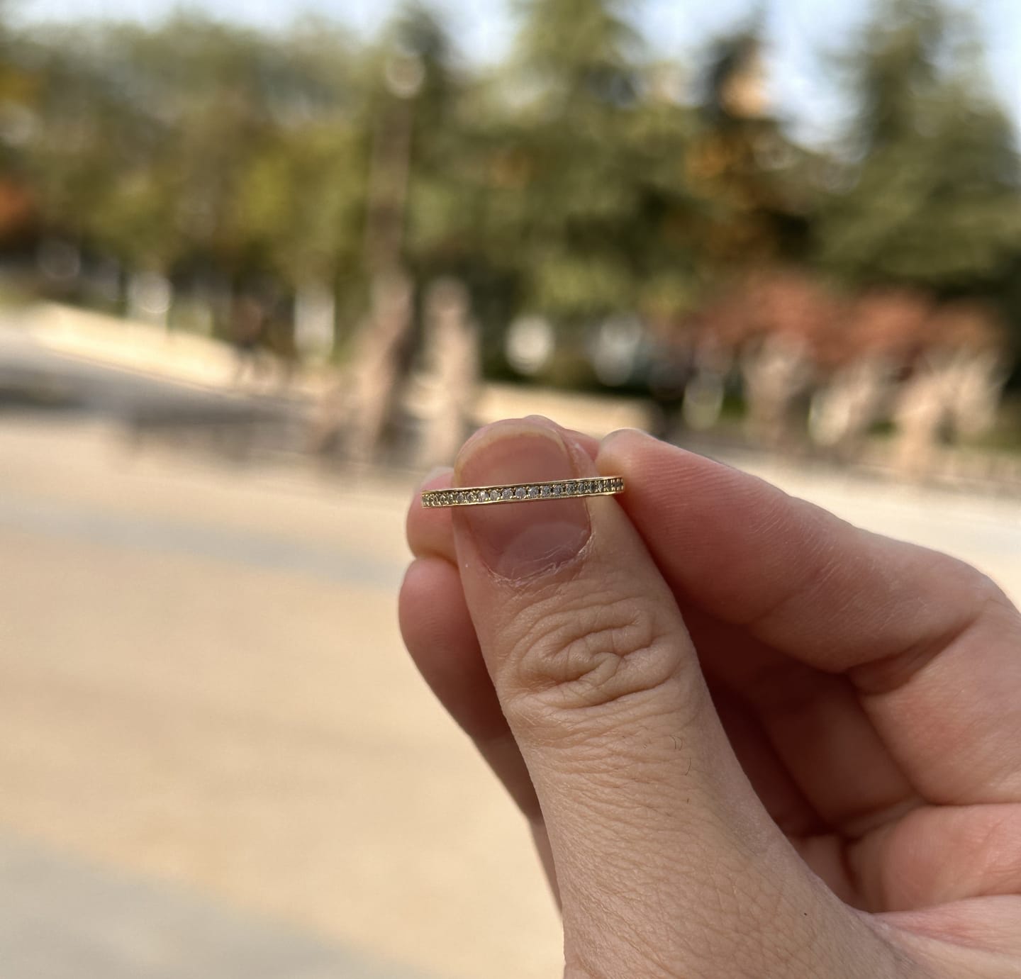 Customer photo review of Louily Yellow Gold Channel Set Curved Half Wedding Band
