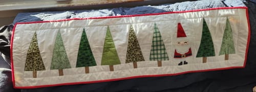 Customer photo review of Santa in the Trees Table Runner Pattern