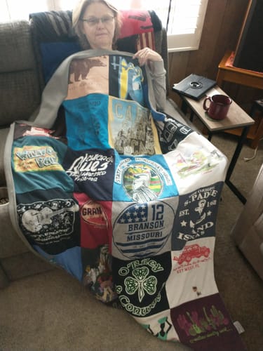 T-shirt quilt with traveling, family gatherings themes by David from CA