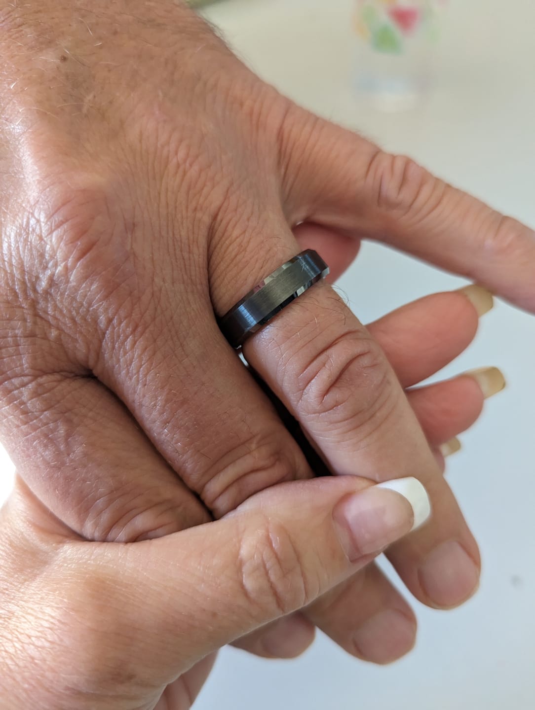 Customer photo review of 6mm Gun Metal Tungsten Carbide Wedding Band with Beveled Edges