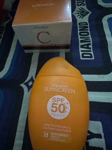 Customer photo review of SunScreen Non-Greasy SPF 50 +++