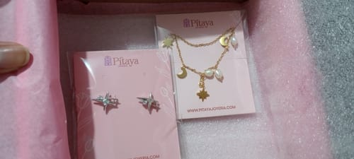 Customer photo review of Aretes Estrella Orión