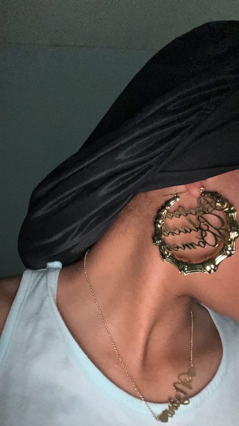 Customer photo review of 18k Gold Plated Protect Black Women Bamboo Hoop Earrings