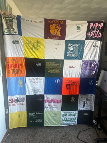 T-shirt quilt with running, walking themes by Colleen from PA