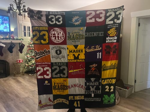T-shirt quilt featuring orioles, gator by Angela from PA
