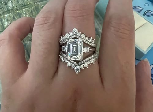 Customer photo review of Elegance Emerald Cut 4ct Moissanite Engagement Ring
