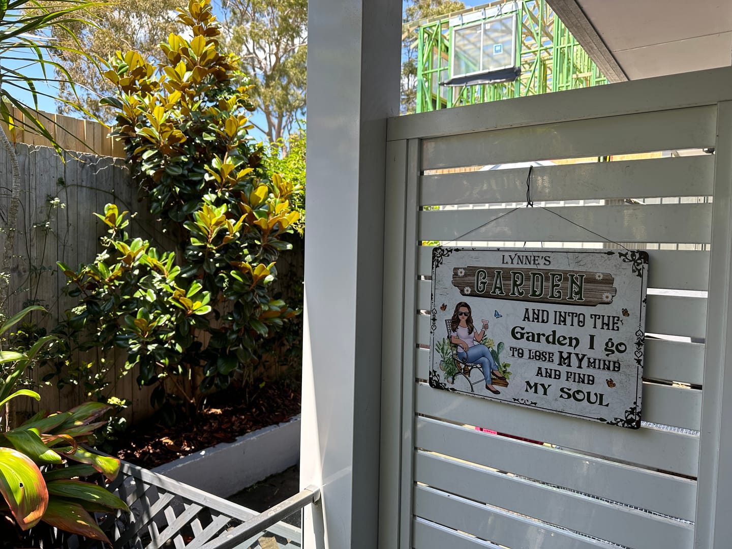 Customer photo review of And Into The Garden I Go Gardening Girl - Garden Sign - Personalized Custom Classic Metal Signs