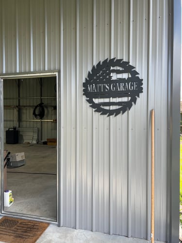Customer photo review of Personalized Garage Saw Sign with American Flag