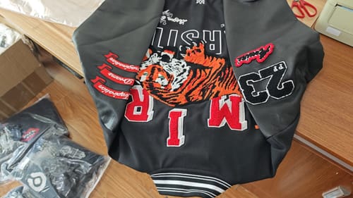 Customer photo review of AMIRI Varsity Vintage Patch Bomber Jacket