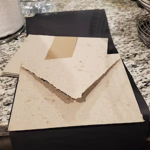 Customer photo review of Handmade Junk Mail Deckle Edge Envelopes