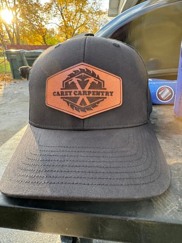 Customer photo review of Custom Leather Patch Trucker Hat - Richardson 112