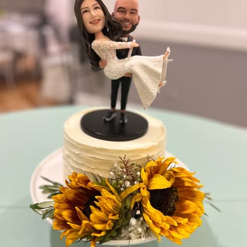 Customer photo review of Bridegroom Holds The Bride Custom Bobblehead