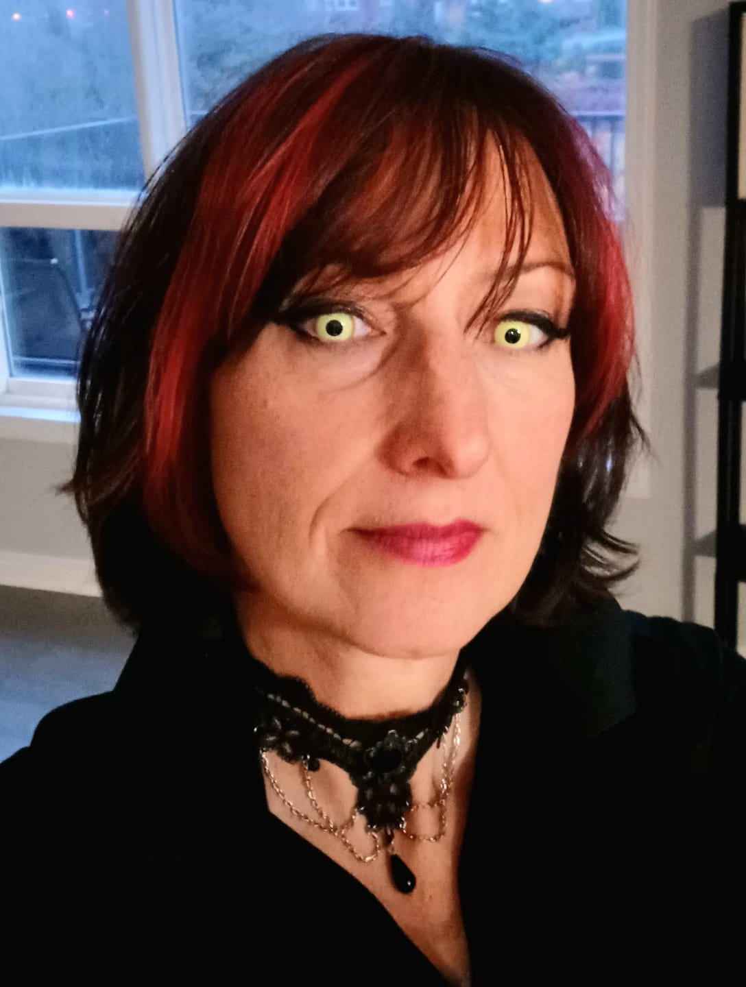Customer photo review of PRIMAL ® Nightcrawler - Neon Yellow with Orange Rim Color Contact lenses