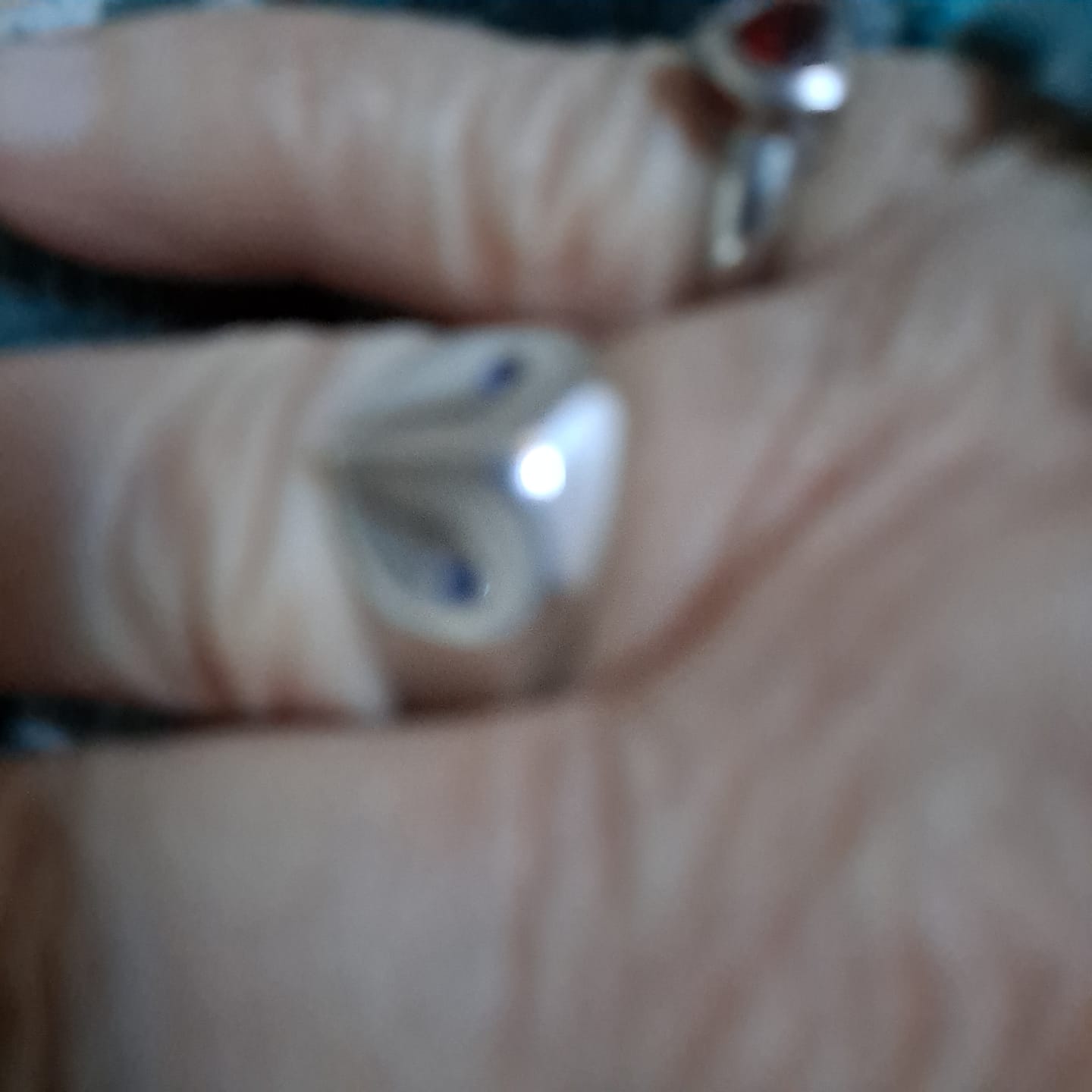 Customer photo review of Owl Ring with Sapphire Eyes