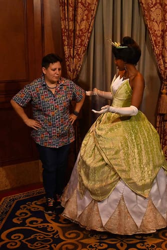 Customer photo review of Disney100 “Disney Deco” – Women's KUNUFLEX Short Sleeve Shirt