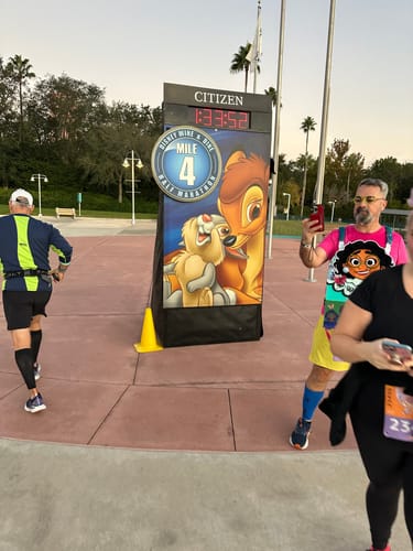 Customer photo review of Disney100 “Dancing Toons” – Women's KUNUFLEX Short Sleeve Shirt