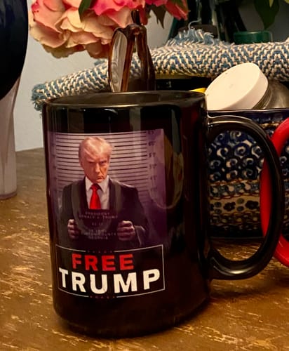 Customer photo review of Trump Mugshot Sign 15oz Coffee Mug